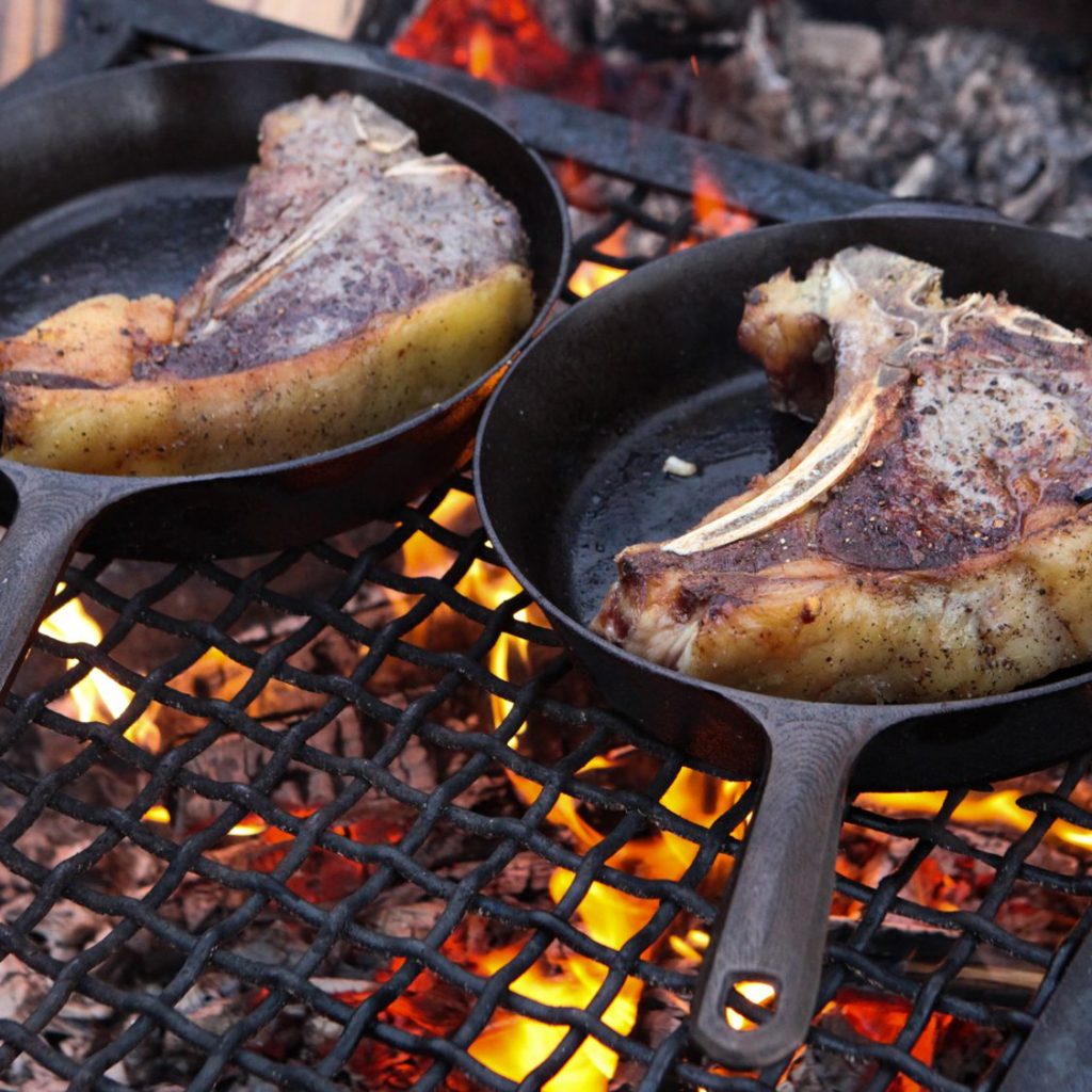 Grilling steak on cast iron pan
